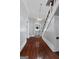 Foyer features hardwood floors, high ceilings, and a classic staircase at 35 W Main St, Hampton, GA 30228