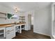 Bright kitchen featuring butcher block countertops and open shelving, combining style and functionality at 35 W Main St, Hampton, GA 30228