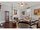 Cozy living room features classic decor, a fireplace, and ample seating at 35 W Main St, Hampton, GA 30228
