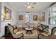 Cozy living room features classic decor, a fireplace, and ample seating at 35 W Main St, Hampton, GA 30228