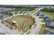 Aerial view highlighting the community layout, green spaces, and streetscapes at 104 Conway St, Peachtree City, GA 30269