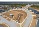 Overhead shot of a well-planned community, featuring a central common area and organized street layout at 104 Conway St, Peachtree City, GA 30269