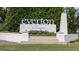 Welcoming 'Everton Villages' community sign, set amid landscaped greenery and flowers at 104 Conway St, Peachtree City, GA 30269
