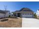 Charming single-story home features a manicured front yard, attached garage, and welcoming front porch at 104 Conway St, Peachtree City, GA 30269