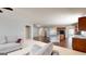 Open concept living area connecting to a modern kitchen with stainless appliances at 104 Conway St, Peachtree City, GA 30269