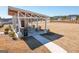 Community outdoor patio with tables, chairs, and nearby houses, ideal for social gatherings at 104 Conway St, Peachtree City, GA 30269