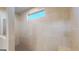 Walk-in shower with custom tile work and a window providing natural light at 104 Conway St, Peachtree City, GA 30269