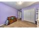 Bedroom featuring ample closet space, natural light and neutral carpet at 39 Thorne Berry Dr, Hampton, GA 30228