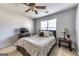 Neutral bedroom features a ceiling fan, cozy carpet and lots of natural light at 39 Thorne Berry Dr, Hampton, GA 30228