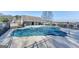 Community pool is covered for the off-season with picnic and grill areas for residents at 39 Thorne Berry Dr, Hampton, GA 30228