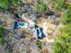 An overhead shot of the house with circular driveway and backyard pool at 3140 Cox Cemetery Rd, Social Circle, GA 30025