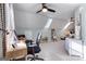 Bedroom with skylights, ceiling fan, and comfortable seating, offering a peaceful retreat for relaxation and rest at 3140 Cox Cemetery Rd, Social Circle, GA 30025