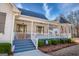 Inviting front porch with welcoming decor and a seating area, perfect for enjoying the outdoors at 3140 Cox Cemetery Rd, Social Circle, GA 30025