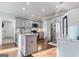 Charming kitchen featuring stainless steel appliances, granite counters, and a functional center island at 3140 Cox Cemetery Rd, Social Circle, GA 30025