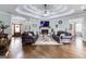 Spacious living room with hardwood floors, fireplace, and stylish decor offers a warm and inviting atmosphere at 3140 Cox Cemetery Rd, Social Circle, GA 30025