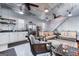 Open-concept living space with a kitchenette and a cozy seating area in a pool house at 3140 Cox Cemetery Rd, Social Circle, GA 30025