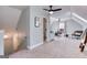 Upstairs loft with neutral carpet, ceiling fans, and plenty of space at 3140 Cox Cemetery Rd, Social Circle, GA 30025