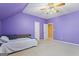 Bright bedroom with ample space, featuring neutral carpet and a view of the open doorway at 122 Lawn Market, Sharpsburg, GA 30277