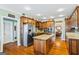 Well-equipped kitchen featuring granite countertops, stainless steel appliances, and ample wooden cabinetry at 122 Lawn Market, Sharpsburg, GA 30277
