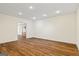 Spacious living room with wood floors and neutral walls, offering a versatile layout at 122 Lawn Market, Sharpsburg, GA 30277