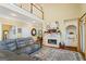 Inviting living room with fireplace, plush seating, and open layout at 122 Lawn Market, Sharpsburg, GA 30277