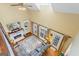Open living room with high ceilings, fireplace, and large windows at 122 Lawn Market, Sharpsburg, GA 30277