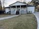 Charming single-story home featuring a covered front porch and well-maintained lawn at 4100 Scott S Dr # 0, Forest Park, GA 30297