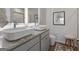 Stylish bathroom with double vanities, granite counters, vessel sinks and contemporary mirrors at 223 Ivey Ter # 34, Temple, GA 30179
