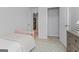 Bedroom with closet, vintage drawers, and white bed spread at 223 Ivey Ter # 34, Temple, GA 30179