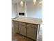 Granite countertops accent the kitchen island, perfect for dining and entertaining at 223 Ivey Ter # 34, Temple, GA 30179