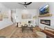 Inviting living room with modern fireplace, ceiling fan, and stylish decor at 223 Ivey Ter # 34, Temple, GA 30179