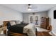 Bedroom with ceiling fan, back patio access, and a view of the outdoor scenery at 4864 Yeagar Rd, Douglasville, GA 30135