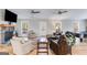 Bright and open living room featuring hardwood floors, a fireplace, and comfortable seating at 4864 Yeagar Rd, Douglasville, GA 30135