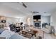 Spacious living room with a fireplace, hardwood floors, and comfortable seating arrangements at 4864 Yeagar Rd, Douglasville, GA 30135