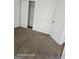 Cozy bedroom featuring neutral carpet, fresh paint, and closet, offering a comfortable and inviting space at 11187 Shannon Cir, Hampton, GA 30228