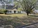 Charming single-story home with a well-maintained lawn and mature tree, located on a tree-filled street at 11187 Shannon Cir, Hampton, GA 30228