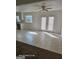 Open living area featuring tiled floors, white walls and natural light at 11187 Shannon Cir, Hampton, GA 30228