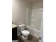 Bathroom features a standard toilet and tub/shower combo with white surround at 229 Ivey Ter # 37, Temple, GA 30179
