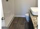 Bathroom featuring a shower, toilet, and modern vanity with a granite countertop and a vessel sink at 229 Ivey Ter # 37, Temple, GA 30179