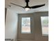 Bedroom with ceiling fan and two windows bringing in natural light at 231 Ivey Ter # 38, Temple, GA 30179