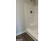 Clean shower with a built-in seat, showcasing a functional and modern design for comfortable bathing at 233 Ivey Ter # 39, Temple, GA 30179