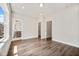 Bedroom with hardwood floors, an ensuite bathroom and walk-in closet at 2443 Sycamore Nw Rd, Atlanta, GA 30318