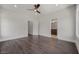 This bedroom has hardwood floors, and doors that lead to the bathroom and closet at 2443 Sycamore Nw Rd, Atlanta, GA 30318