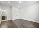 This bedroom features recessed lighting and wood floors, with an ensuite bathroom at 2443 Sycamore Nw Rd, Atlanta, GA 30318