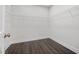 Walk-in closet with wire shelving and hardwood floors at 2443 Sycamore Nw Rd, Atlanta, GA 30318