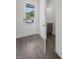 Entryway featuring a white door and neutral-toned walls leading to a half-bathroom at 2443 Sycamore Nw Rd, Atlanta, GA 30318