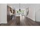 Modern open-concept kitchen featuring a center island, and hardwood floors at 2443 Sycamore Nw Rd, Atlanta, GA 30318