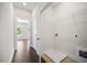 Laundry room with washer hookups and white wire shelving at 2443 Sycamore Nw Rd, Atlanta, GA 30318