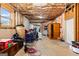 Unfinished basement with exterior window and access door at 1198 Elliot Rd, Mcdonough, GA 30252