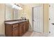 Bathroom featuring a granite countertop vanity, mirror and wood cabinets at 1198 Elliot Rd, Mcdonough, GA 30252